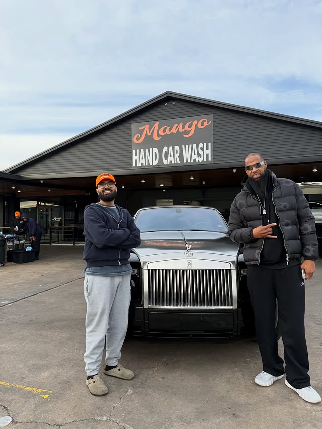Mango Hand Car Wash team outside the shop